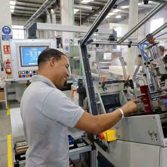 Jackrom operator Elton Blumer working with the die-cutting and automation systems